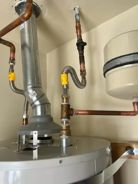 Water heater installation and plumbing repair in Rial Side